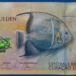 2025. 10 Karibi Gulden AUNC
